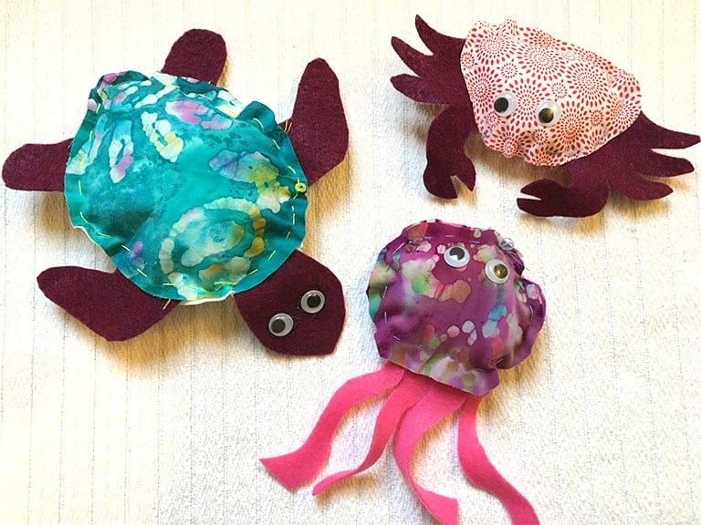 3 Beginner Sewing Projects for kids feature image - hand stitched sea turtle, jelly fish and crab