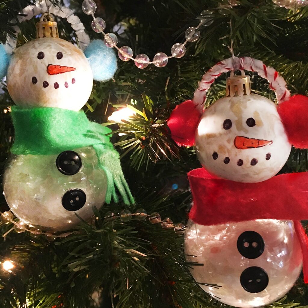 Square feature image of two DIY snowman ornaments made with ball ornaments and Dollar Tree Supplies.
