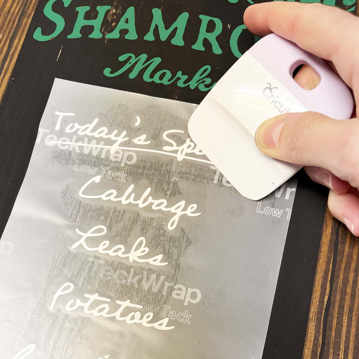 Using permanent vinyl for the handwritten script type of 'Today's Specials, Cabbage, Leaks, Potatoes and so on.