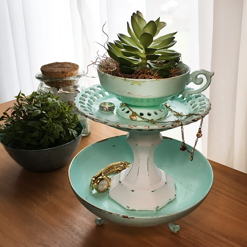 Teacup Tiered Tray finished with a succulent in the teacup with jewelry on the tiers.