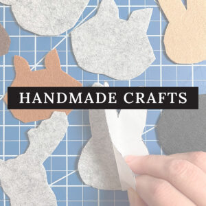 Square image button for Mobile under the Crafts menu for Handmade Crafts. Here are felt woodland animals being cut cut as a background image.