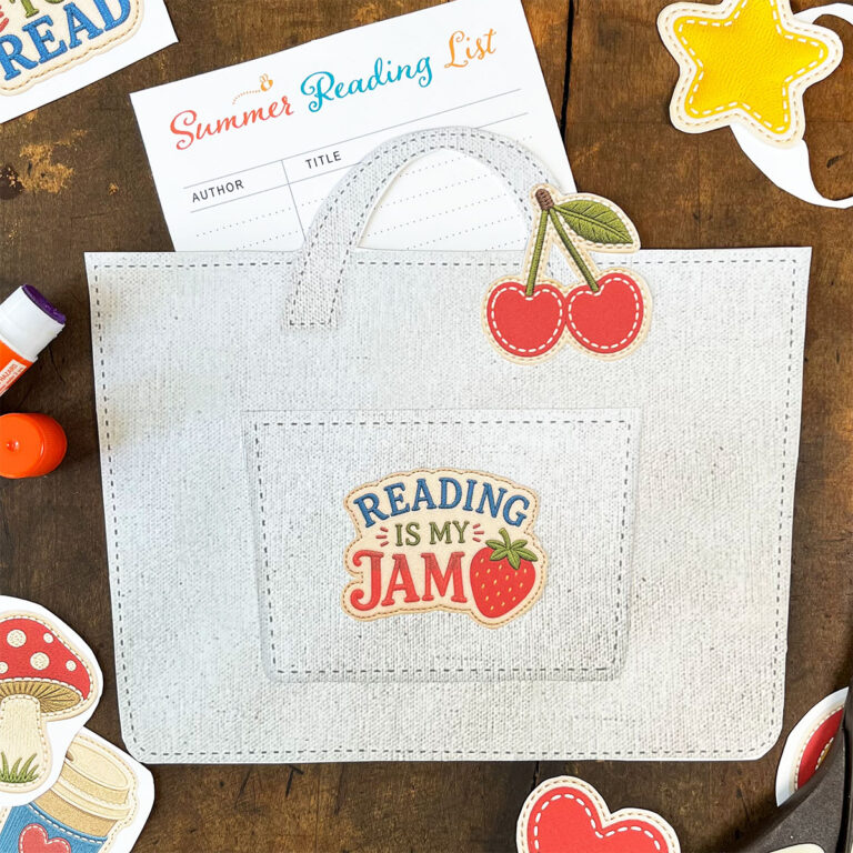 Zoomed in photo -- Paper Snail Club summer reading tote printable with a reading list, colorful patch decorations, scissors, and cutout paper pieces ready to assemble.