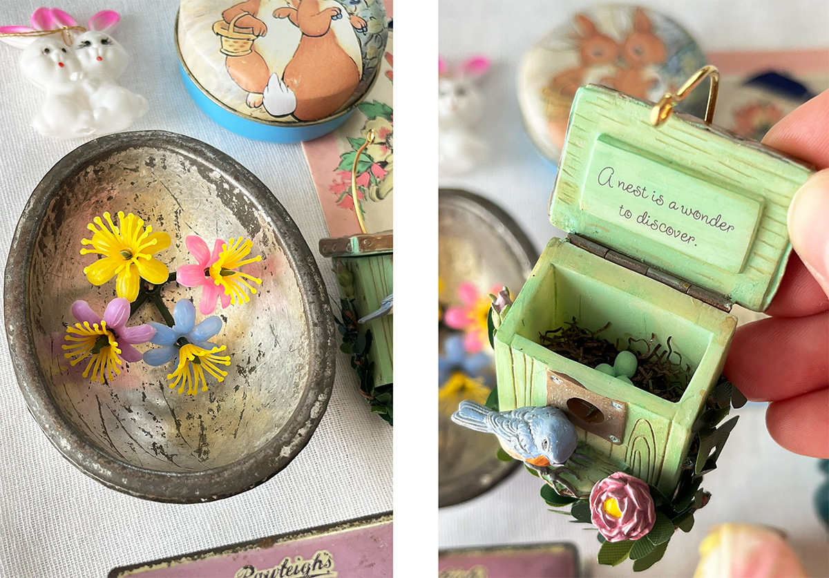 Photo 1: Vintage metal egg-shaped chocolate mold holding colorful pastel millinery flowers, surrounded by nostalgic Easter keepsakes including a rabbit tin and miniature bunny ornament. Photo 2: Hand holding a miniature birdhouse ornament with a tiny blue bird and nest, featuring the handwritten phrase "A nest is a wonder to discover," displayed among vintage Easter decorations.